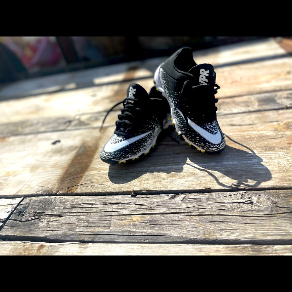 Like new white & black football cleats.